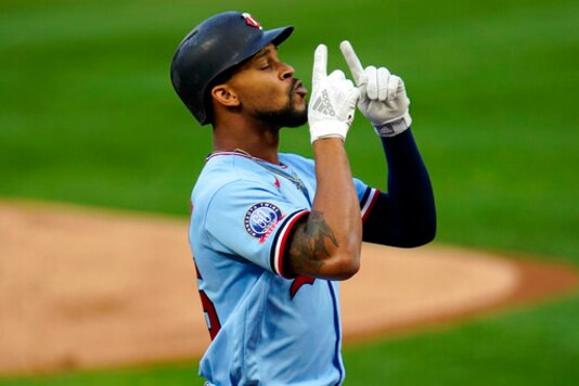 Minnesota Twins' Byron Buxton celebrates his solo home run off Detroit Tigers pitcher Tarik Skubal in the first inning of a baseball game Tuesday, Sept. 22, 2020, in Minneapolis. (AP Photo/Jim Mone)