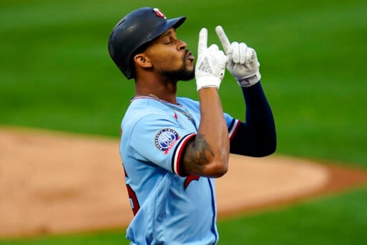 Minnesota Twins' Byron Buxton celebrates his solo home run off Detroit Tigers pitcher Tarik Skubal in the first inning of a baseball game Tuesday, Sept. 22, 2020, in Minneapolis. (AP Photo/Jim Mone) Minnesota Twins' Byron Buxton celebrates his solo home run off Detroit Tigers pitcher Tarik Skubal in the first inning of a baseball game Tuesday, Sept. 22, 2020, in Minneapolis. (AP Photo/Jim Mone)