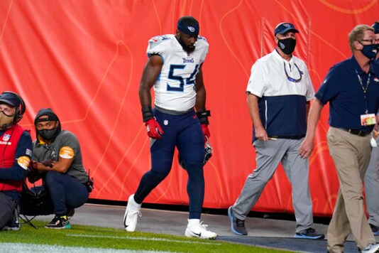 Tennessee Titans inside linebacker Rashaan Evans (54) leaves the field after being ejected during the first half of an NFL football game against the Denver Broncos, Monday, Sept. 14, 2020, in Denver. (AP Photo/Jack Dempsey)