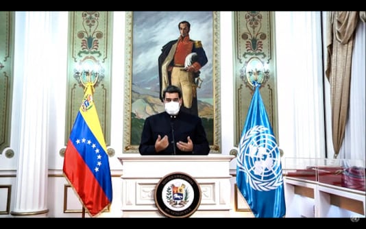 In this UNTV image, Nicols Maduro Moros, President of Venezuela, wears a mask as he speaks in a pre-recorded video message during the 75th session of the United Nations General Assembly, Wednesday, Sept. 23, 2020, at UN headquarters in New York. The U.N.'s first virtual meeting of world leaders started Tuesday with pre-recorded speeches from heads-of-state, kept at home by the coronavirus pandemic. (UNTV via AP)