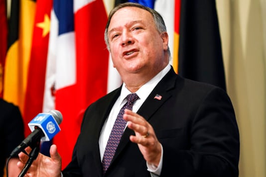 FILE - In this Thursday, Aug. 20, 2020 file photo, Secretary of State Mike Pompeo speaks to reporters following a meeting with members of the U.N. Security Council, at the United Nations. The United States is preparing to declare that all international sanctions against Iran have been restored, despite overwhelming opposition. Few countries believe restoring all international sanctions is legal, and the U.S. move could provoke a credibility crisis at the United Nations.(Mike Segar/Pool via AP, File)