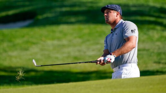 Bryson DeChambeau, of the United States, chips onto the 11th green during the final round of the US Open Golf Championship, Sunday, Sept. 20, 2020, in Mamaroneck, N.Y. (AP Photo/Charles Krupa) Bryson DeChambeau, of the United States, chips onto the 11th green during the final round of the US Open Golf Championship, Sunday, Sept. 20, 2020, in Mamaroneck, N.Y. (AP Photo/Charles Krupa)