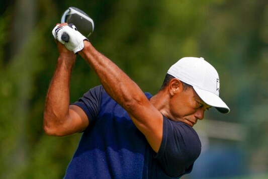 Tiger Woods, of the United States, plays his shot from the 14th tee during the first round of the US Open Golf Championship, Thursday, Sept. 17, 2020, in Mamaroneck, N.Y. (AP Photo/Charles Krupa) Tiger Woods, of the United States, plays his shot from the 14th tee during the first round of the US Open Golf Championship, Thursday, Sept. 17, 2020, in Mamaroneck, N.Y. (AP Photo/Charles Krupa)