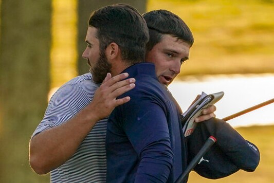 Bryson DeChambeau, of the United States, right, hugs Matthew Wolff, of the United States, after winning the US Open Golf Championship, Sunday, Sept. 20, 2020, in Mamaroneck, N.Y. (AP Photo/John Minchillo) Bryson DeChambeau, of the United States, right, hugs Matthew Wolff, of the United States, after winning the US Open Golf Championship, Sunday, Sept. 20, 2020, in Mamaroneck, N.Y. (AP Photo/John Minchillo)