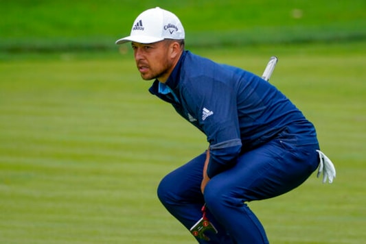 Xander Schauffele, of the United States, checks the break on the 17th green during the second round of the US Open Golf Championship, Friday, Sept. 18, 2020, in Mamaroneck, N.Y. (AP Photo/Charles Krupa) Xander Schauffele, of the United States, checks the break on the 17th green during the second round of the US Open Golf Championship, Friday, Sept. 18, 2020, in Mamaroneck, N.Y. (AP Photo/Charles Krupa)