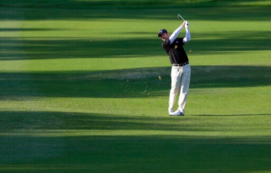 FILE - In this March 14, 2013, file photo, Andy Pope hits from the shadows on the fifth fairway during the first round of the Tampa Bay Championship golf tournament in Palm Harbor, Fla. Pope was among those unable to qualify for the U.S. Open this year because the COVID-19 pandemic led to an all-exempt field for Winged Foot. (AP Photo/Chris O'Meara, File)