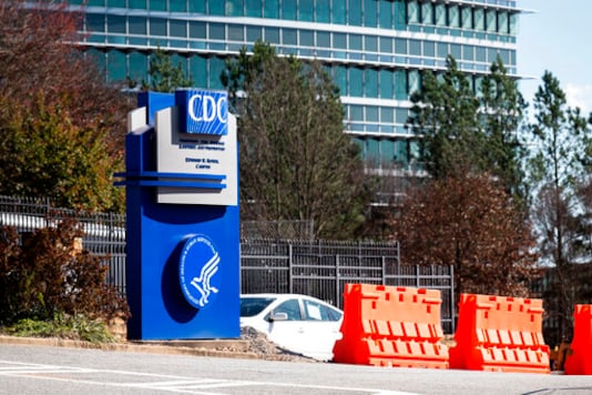 FILE - In this March 6, 2020, file photo, the headquarters for Centers for Disease Control and Prevention in Atlanta. About 2.5 million more working-age Americans were uninsured last year, even before the coronavirus pandemic struck. That's according to a study issued Wednesday by the Centers for Disease Control and Prevention.  (AP Photo/ Ron Harris, File)