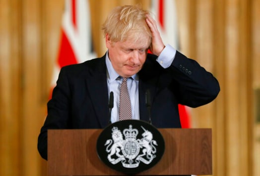 FILE - In this Tuesday, March 3, 2020 file photo, Britain's Prime Minister Boris Johnson gestures, during a press conference at Downing Street on the government's coronavirus action plan in London. Britain botched its response to the coronavirus the first time around. Now many scientists fear its about to do it again.
The virus is on the rise again in the U.K., which has recorded almost 42,000 COVID-19 deaths, with confirmed infections at their highest level since May.  (AP Photo/Frank Augstein, Pool, File)