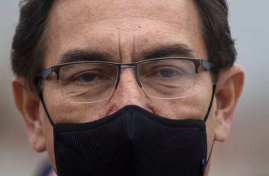 Peru's President Martin Vizcarra attends the start of a house-to-house coronavirus testing drive and food distribution in Villa el Salvador, on the outskirts of Lima, Peru, Tuesday, Sept. 15, 2020. (AP Photo/Rodrigo Abd) Peru's President Martin Vizcarra attends the start of a house-to-house coronavirus testing drive and food distribution in Villa el Salvador, on the outskirts of Lima, Peru, Tuesday, Sept. 15, 2020. (AP Photo/Rodrigo Abd)