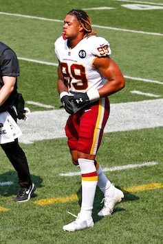 Washington Football Team defensive end Chase Young limps back to the locker room during the first half of an NFL football game against the Cleveland Browns, Sunday, Sept. 27, 2020, in Cleveland. (AP Photo/Ron Schwane) Washington Football Team defensive end Chase Young limps back to the locker room during the first half of an NFL football game against the Cleveland Browns, Sunday, Sept. 27, 2020, in Cleveland. (AP Photo/Ron Schwane)