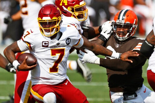 Washington Football Team quarterback Dwayne Haskins (7) scrambles during the second half of an NFL football game against the Cleveland Browns, Sunday, Sept. 27, 2020, in Cleveland. (AP Photo/Ron Schwane)