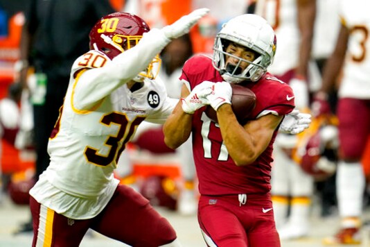 Arizona Cardinals wide receiver Andy Isabella (17) pulls in a pass as Washington Football Team free safety Troy Apke (30) defends during the first half of an NFL football game, Sunday, Sept. 20, 2020, in Glendale, Ariz. (AP Photo/Ross D. Franklin)