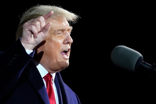 In this September 30, 2020 photo, President Donald Trump speaks at a campaign rally at Duluth International Airport in Duluth, Minnesota. (AP Photo/File)