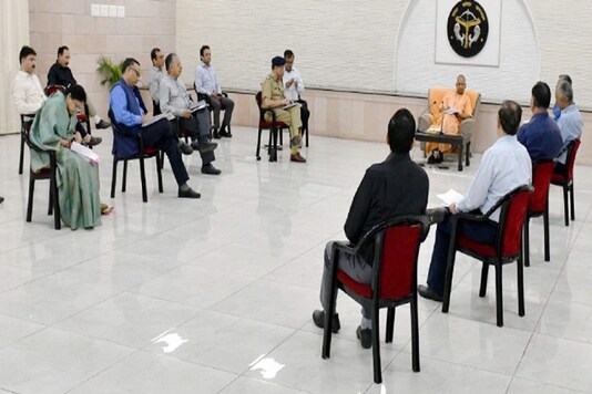 File photo: UP Chief Minister Yogi Adityanath holds a meeting with officials at his residence in Lucknow. (PTI)