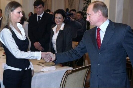 Russian President Vladimir Putin with alleged ex-lover Alina Kabaeva.
(Credit: AFP)