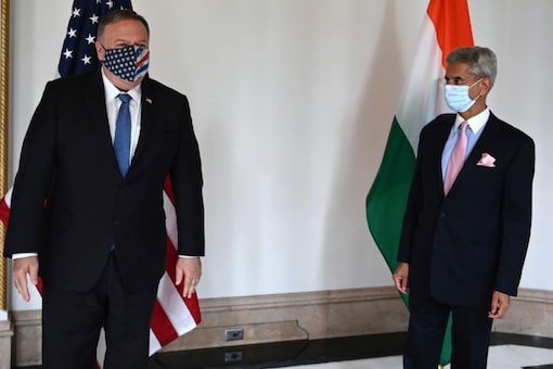 US Secretary of State Mike Pompeo and Indian Foreign Minister S Jaishankar arrive to attend their meeting in Tokyo, on October 6, 2020, ahead of the four Indo-Pacific nations' foreign ministers meeting. (Charly Triballeau/Pool Photo via AP)