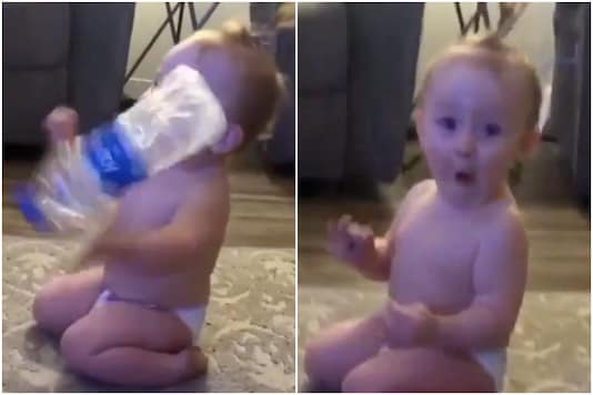 Baby's Expression after Spectacularly Acing 'Flip the Bottle' Challenge is Winning Internet