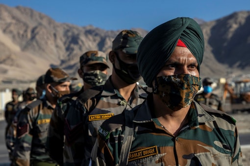 Indian soldiers stand in a formation after disembarking from a military transport plane at a forward airbase in Leh, in the Ladakh region (File photo/Reuters)