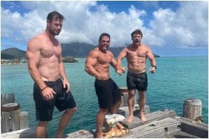 Chris Hemsworth Shows Off Insanely Ripped Body on Beach Vacation with Family