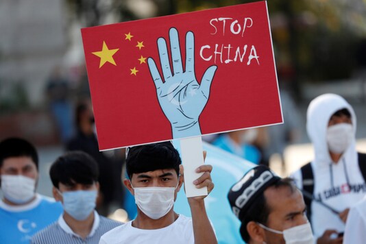 Ethnic Uighur demonstrators take part in a protest against China, in Istanbul, Turkey on October 1, 2020. (REUTERS/Murad Sezer)
