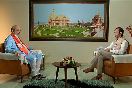 Union Home Minister Amit Shah in conversation with Rahul Joshi. (News18 images) Union Home Minister Amit Shah in conversation with Rahul Joshi. (News18 images)