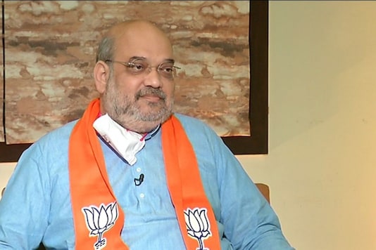 Union Home Minister Amit Shah in conversation with News18 Network editor-in-chief Rahul Joshi. (News18 images)