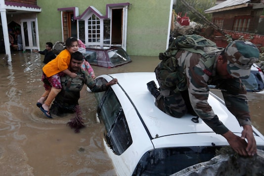 Soldiers rescue a girl from her flooded house in Srinagar on September 10, 2014. The Indian Army and Air Force rescued over 200,000 civilians, established relief camps, restored road communications, and reconstructed damaged bridges that year. (REUTERS/Adnan Abidi) Soldiers rescue a girl from her flooded house in Srinagar on September 10, 2014. The Indian Army and Air Force rescued over 200,000 civilians, established relief camps, restored road communications, and reconstructed damaged bridges that year. (REUTERS/Adnan Abidi)