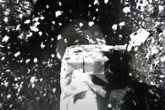 In this image taken from video released by NASA, regolith is dispersed as the Osiris-Rex spacecraft attempts to take a sample of the surface of asteroid Bennu on Tuesday, Oct. 20, 2020. (NASA via AP)
In this image taken from video released by NASA, regolith is dispersed as the Osiris-Rex spacecraft attempts to take a sample of the surface of asteroid Bennu on Tuesday, Oct. 20, 2020. (NASA via AP)