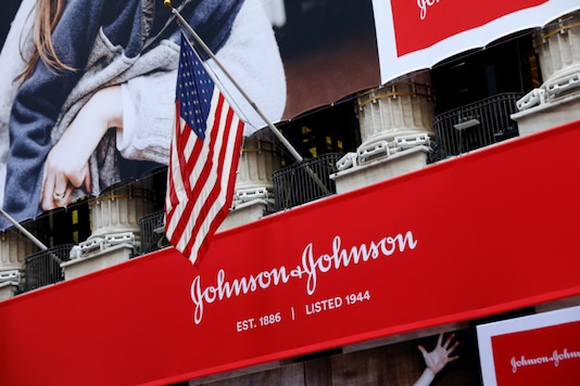 The US flag is seen over the company logo for Johnson & Johnson to celebrate the 75th anniversary of the company's listing at the New York Stock Exchange (NYSE), on September 17, 2019. (REUTERS/Brendan McDermid/File Photo) The US flag is seen over the company logo for Johnson & Johnson to celebrate the 75th anniversary of the company's listing at the New York Stock Exchange (NYSE), on September 17, 2019. (REUTERS/Brendan McDermid/File Photo)