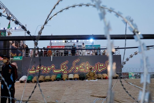 Only for representation: Supporters of the Pakistan Democratic Movement (PDM), an alliance of political opposition parties, gather for evening prayers during an anti-government protest rally in Karachi, Pakistan October 18, 2020. REUTERS/Akhtar Soomro
Only for representation: Supporters of the Pakistan Democratic Movement (PDM), an alliance of political opposition parties, gather for evening prayers during an anti-government protest rally in Karachi, Pakistan October 18, 2020. REUTERS/Akhtar Soomro