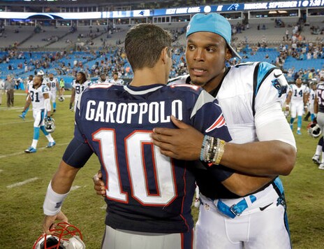 FILE - In this Aug, 26, 2016, file photo, then-New England Patriots' Jimmy Garoppolo, left, and then-Carolina Panthers' Cam Newton, right, hug after a preseason NFL football game in Charlotte, N.C.  When quarterback Jimmy Garoppolo was Tom Bradys backup in New England, his teammates used to call him a gamer because of his ability to keep plays alive in the pocket and make throws under pressure. Now the player who was long assumed to be Bradys heir apparent returns to face his former team for the first time since being traded to the 49ers. Hell be trying to add to the recent struggles of Patriots team now led by Cam Newton that is below .500 through five games for the first time since 2001.  (AP Photo/Bob Leverone, File)