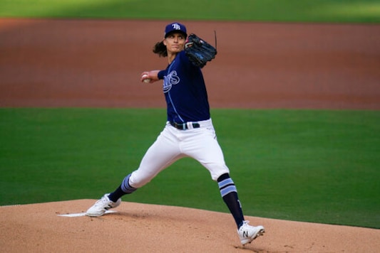Tampa Bay Rays starting pitcher Tyler Glasnow winds up during the first inning in Game 5 of the baseball team's AL Division Series against the New York Yankees, Friday, Oct. 9, 2020, in San Diego. (AP Photo/Gregory Bull) Tampa Bay Rays starting pitcher Tyler Glasnow winds up during the first inning in Game 5 of the baseball team's AL Division Series against the New York Yankees, Friday, Oct. 9, 2020, in San Diego. (AP Photo/Gregory Bull)