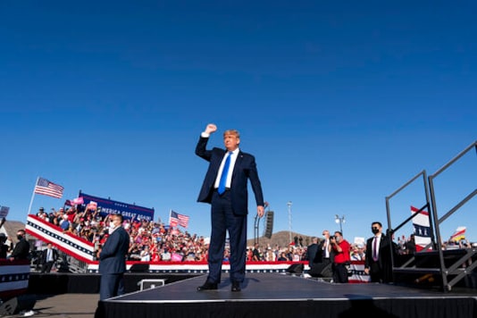 President Donald Trump arrives to speak at a campaign rally at Carson City Airport, Sunday, Oct. 18, 2020, in Carson City, Nev. (AP Photo/Alex Brandon) President Donald Trump arrives to speak at a campaign rally at Carson City Airport, Sunday, Oct. 18, 2020, in Carson City, Nev. (AP Photo/Alex Brandon)