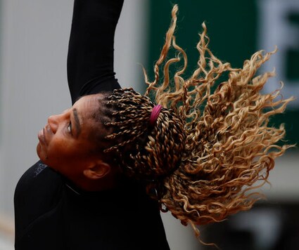 Serena Williams of the U.S. plays a shot against Kristie Ahn of the U.S. in the first round match of the French Open tennis tournament at the Roland Garros stadium in Paris, France, Monday, Sept. 28, 2020. (AP Photo/Alessandra Tarantino)