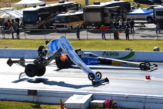 In this photo provided by the NHRA, Leah Pritchett's Top Fuel car breaks apart during the second round of eliminations at the Mopar Express Lane NHRA Midwest Nationals drag races Sunday, Oct. 4, 2020, at World Wide Technology Raceway in Madison, Ill. Pritchett walked away from the crash. (Gary Nastase/Auto Imagery via NHRA via AP) In this photo provided by the NHRA, Leah Pritchett's Top Fuel car breaks apart during the second round of eliminations at the Mopar Express Lane NHRA Midwest Nationals drag races Sunday, Oct. 4, 2020, at World Wide Technology Raceway in Madison, Ill. Pritchett walked away from the crash. (Gary Nastase/Auto Imagery via NHRA via AP)