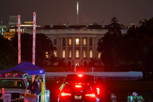 The White House is seen in Washington, early Friday, Oct. 2, 2020, after President Donald Trump announced that he and first lady Melania Trump have tested positive for the coronavirus. (AP Photo/J. Scott Applewhite) The White House is seen in Washington, early Friday, Oct. 2, 2020, after President Donald Trump announced that he and first lady Melania Trump have tested positive for the coronavirus. (AP Photo/J. Scott Applewhite)