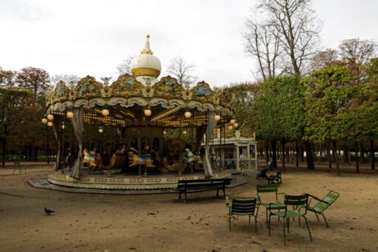 An empty carousel is pictured in the Tuileries gardens Wednesday, Oct.14, 2020 in Paris. French President Emmanuel Macron is giving a nationally televised interview Wednesday night to speak about the virus, his first in months. French media reports say Macron will also step up efforts on social media to press the need for virus protections among young people. (AP Photo/Lewis Joly) An empty carousel is pictured in the Tuileries gardens Wednesday, Oct.14, 2020 in Paris. French President Emmanuel Macron is giving a nationally televised interview Wednesday night to speak about the virus, his first in months. French media reports say Macron will also step up efforts on social media to press the need for virus protections among young people. (AP Photo/Lewis Joly)