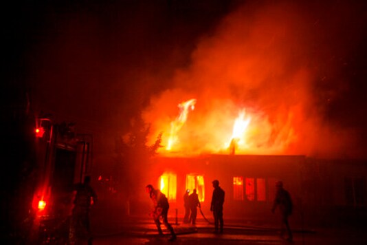 Firefighters work as building of a residential area burns after night shelling in Stepanakert, the self-proclaimed Republic of Nagorno-Karabakh, Azerbaijan, Saturday, Oct. 3, 2020. Heavy fighting between Azerbaijani and Armenian forces in the region since Sept. 27 has killed scores of both servicemen and civilians. Nagorno-Karabakh lies inside Azerbaijan but has been under the control of ethnic Armenian forces backed by Armenia since the 1994. (AP Photo/Karen Mirzoyan) Firefighters work as building of a residential area burns after night shelling in Stepanakert, the self-proclaimed Republic of Nagorno-Karabakh, Azerbaijan, Saturday, Oct. 3, 2020. Heavy fighting between Azerbaijani and Armenian forces in the region since Sept. 27 has killed scores of both servicemen and civilians. Nagorno-Karabakh lies inside Azerbaijan but has been under the control of ethnic Armenian forces backed by Armenia since the 1994. (AP Photo/Karen Mirzoyan)