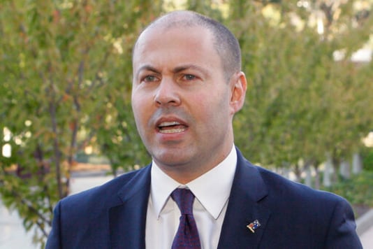 FILE - In this April 2, 2019, file photo, Australian Treasurer Josh Frydenberg addresses the media as he arrives at Parliament House in Canberra, Australia. The Australian government Tuesday, Oct. 6, 2020 will reveal a big spending financial blueprint for the next few years that will drive business investment and job creation while repairing pandemic damage to the economy, the treasurer said. (AP Photo/Rod McGuirk, File) FILE - In this April 2, 2019, file photo, Australian Treasurer Josh Frydenberg addresses the media as he arrives at Parliament House in Canberra, Australia. The Australian government Tuesday, Oct. 6, 2020 will reveal a big spending financial blueprint for the next few years that will drive business investment and job creation while repairing pandemic damage to the economy, the treasurer said. (AP Photo/Rod McGuirk, File)