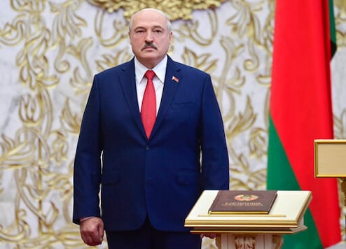 Belarusian President Alexander Lukashenko attends his inauguration ceremony at the Palace of the Independence in Minsk, Belarus, Wednesday, Sept. 23, 2020. Lukashenko of Belarus has assumed his sixth term of office in an inauguration ceremony that wasn't announced in advance. State news agency BelTA reports that the ceremony will take place with several hundred top government official present (Andrei Stasevich/Pool Photo via AP) Belarusian President Alexander Lukashenko attends his inauguration ceremony at the Palace of the Independence in Minsk, Belarus, Wednesday, Sept. 23, 2020. Lukashenko of Belarus has assumed his sixth term of office in an inauguration ceremony that wasn't announced in advance. State news agency BelTA reports that the ceremony will take place with several hundred top government official present (Andrei Stasevich/Pool Photo via AP)
