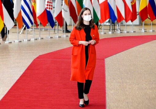 Finland's Prime Minister Sanna Marin arrives for an EU summit in Brussels, Friday, Oct. 16, 2020. European Union leaders meet for the second day of an EU summit, amid the worsening coronavirus pandemic, to discuss topics on foreign policy issues. (Johanna Geron, Pool via AP) Finland's Prime Minister Sanna Marin arrives for an EU summit in Brussels, Friday, Oct. 16, 2020. European Union leaders meet for the second day of an EU summit, amid the worsening coronavirus pandemic, to discuss topics on foreign policy issues. (Johanna Geron, Pool via AP)