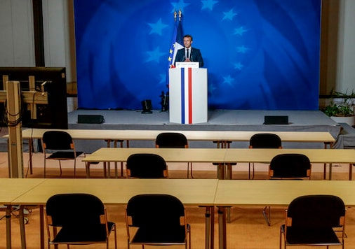French President Emmanuel Macron speaks during a press conference at an EU summit at the European Council building in Brussels, Friday, Oct. 2, 2020. European Union leaders met to address a series of foreign affairs issues ranging from Belarus to Turkey and tensions in the eastern Mediterranean. (Olivier Hoslet, Pool via AP) French President Emmanuel Macron speaks during a press conference at an EU summit at the European Council building in Brussels, Friday, Oct. 2, 2020. European Union leaders met to address a series of foreign affairs issues ranging from Belarus to Turkey and tensions in the eastern Mediterranean. (Olivier Hoslet, Pool via AP)