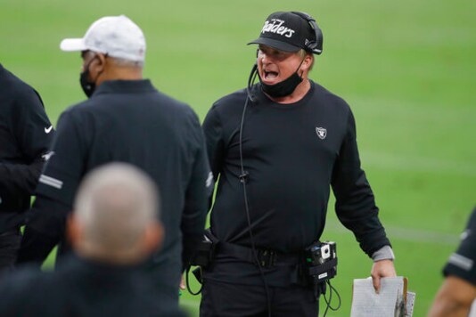 Las Vegas Raiders head coach Jon Gruden speaks on the sideline during the first half of an NFL football game against the Buffalo Bills, Sunday, Oct. 4, 2020, in Las Vegas. (AP Photo/Isaac Brekken) Las Vegas Raiders head coach Jon Gruden speaks on the sideline during the first half of an NFL football game against the Buffalo Bills, Sunday, Oct. 4, 2020, in Las Vegas. (AP Photo/Isaac Brekken)