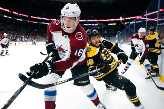 FILE - In this Dec. 7, 2019 file photo, Boston Bruins' David Pastrnak (88) works against Colorado Avalanche's Nikita Zadorov (16) during the second period of an NHL hockey game in Boston. The Avalanche acquired Brandon Saad in a multiplayer trade with the Chicago Blackhawks on Saturday, Oct. 10, 2020. Colorado sent Zadorov and Anton Lindholm to Chicago for Saad and defenseman Dennis Gilbert. The Blackhawks also will retain $1 million of Saads $6 million salary for next season. (AP Photo/Michael Dwyer, File)