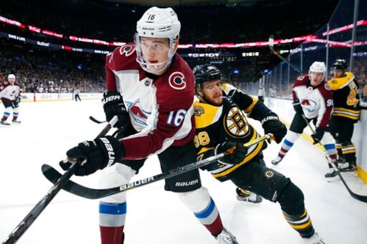 FILE - In this Dec. 7, 2019 file photo, Boston Bruins' David Pastrnak (88) works against Colorado Avalanche's Nikita Zadorov (16) during the second period of an NHL hockey game in Boston. The Avalanche acquired Brandon Saad in a multiplayer trade with the Chicago Blackhawks on Saturday, Oct. 10, 2020. Colorado sent Zadorov and Anton Lindholm to Chicago for Saad and defenseman Dennis Gilbert. The Blackhawks also will retain $1 million of Saads $6 million salary for next season. (AP Photo/Michael Dwyer, File) FILE - In this Dec. 7, 2019 file photo, Boston Bruins' David Pastrnak (88) works against Colorado Avalanche's Nikita Zadorov (16) during the second period of an NHL hockey game in Boston. The Avalanche acquired Brandon Saad in a multiplayer trade with the Chicago Blackhawks on Saturday, Oct. 10, 2020. Colorado sent Zadorov and Anton Lindholm to Chicago for Saad and defenseman Dennis Gilbert. The Blackhawks also will retain $1 million of Saads $6 million salary for next season. (AP Photo/Michael Dwyer, File)