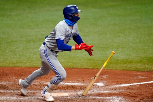 Toronto Blue Jays' Cavan Biggio lines a double off Tampa Bay Rays relief pitcher Nick Anderson during the eighth inning of Game 1 of a wild card series playoff baseball game Tuesday, Sept. 29, 2020, in St. Petersburg, Fla. (AP Photo/Chris O'Meara)
