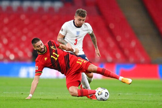 England's Kieran Trippier, right, is challenged by Belgium's Yannick Carrasco during the UEFA Nations League soccer match between England and Belgium at Wembley stadium in London, Sunday, Oct. 11, 2020. (Michael Regan/Pool via AP) England's Kieran Trippier, right, is challenged by Belgium's Yannick Carrasco during the UEFA Nations League soccer match between England and Belgium at Wembley stadium in London, Sunday, Oct. 11, 2020. (Michael Regan/Pool via AP)