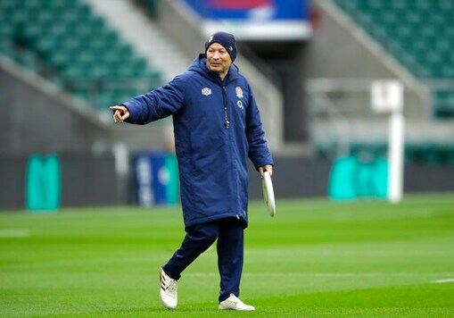 England coach Eddie Jones gestures holding a frisbee during an England rugby team training session at Twickenham in London, Saturday, Oct.17, 2020. England are preparing for a series of matches including the finish of the Six Nations championship which was interrupted earlier in the year because of the coronavirus outbreak. (AP Photo/Matt Dunham, Pool)