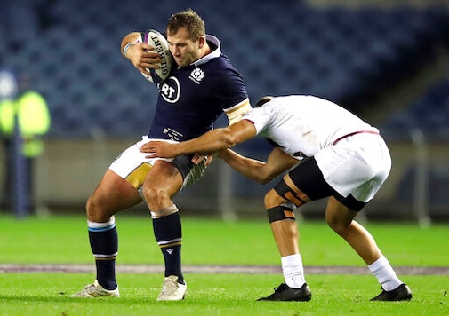 Scotland's Fraser Brown, left, is tackled by Georgia's Merab Sharikadze battle for the ball during the Autumn International rugby match at BT Murrayfield Stadium, Edinburgh, Friday Oct. 23, 2020. (Jane Barlow/PA via AP) Scotland's Fraser Brown, left, is tackled by Georgia's Merab Sharikadze battle for the ball during the Autumn International rugby match at BT Murrayfield Stadium, Edinburgh, Friday Oct. 23, 2020. (Jane Barlow/PA via AP)