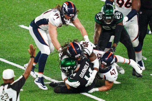 Denver Broncos' A.J. Johnson (45) and Josey Jewell (47) sack New York Jets quarterback Sam Darnold (14) during the second half of an NFL football game Thursday, Oct. 1, 2020, in East Rutherford, N.J. (AP Photo/John Minchillo) Denver Broncos' A.J. Johnson (45) and Josey Jewell (47) sack New York Jets quarterback Sam Darnold (14) during the second half of an NFL football game Thursday, Oct. 1, 2020, in East Rutherford, N.J. (AP Photo/John Minchillo)